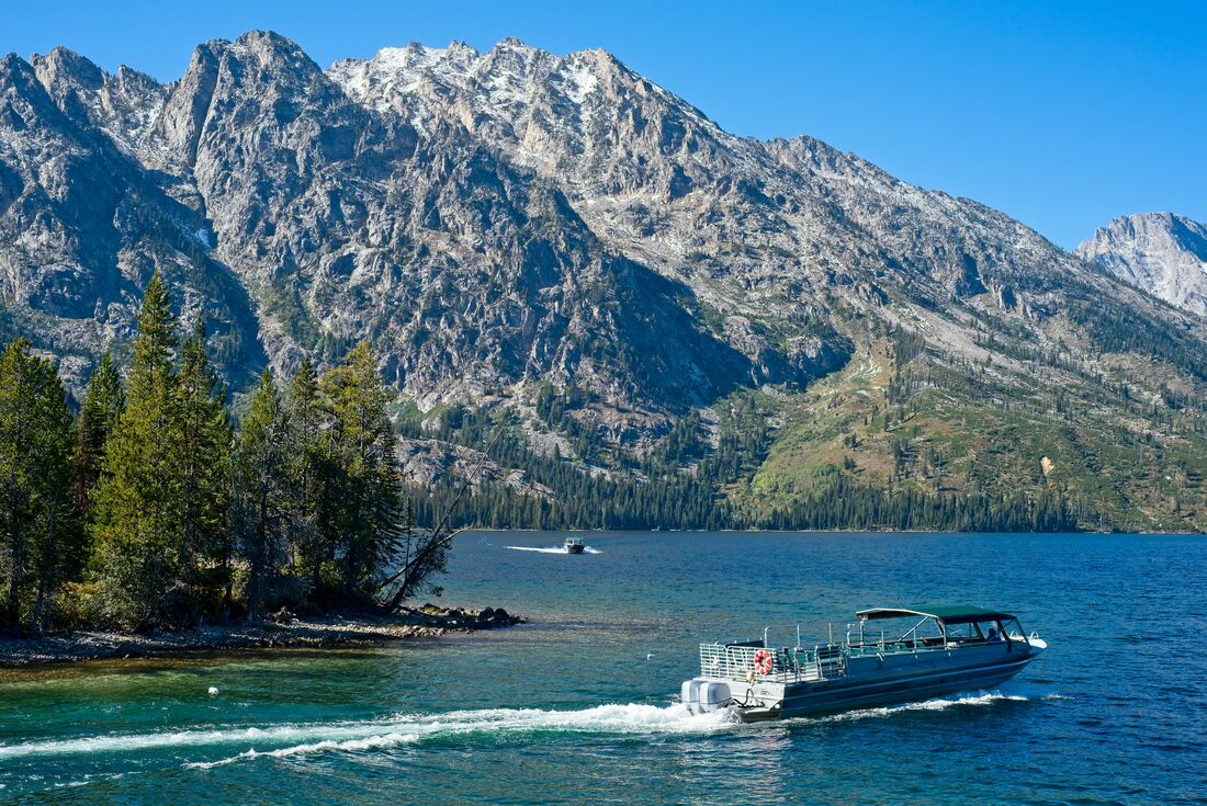 A view from the hiking route around Lake Jenny, with the iconic ferry