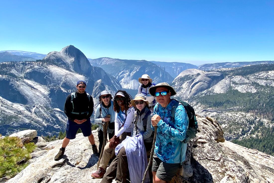 Hikers in Yosemite's High Country looking out over the valley