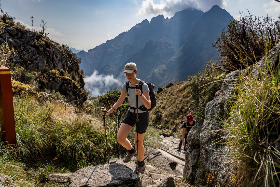 Intrepid traveller hikes toward the Second Pass on the Inca Trail Peru