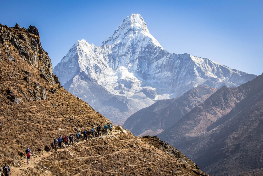Rounding a mountain bend in Nepal, under the eyes of Sagarmāthā