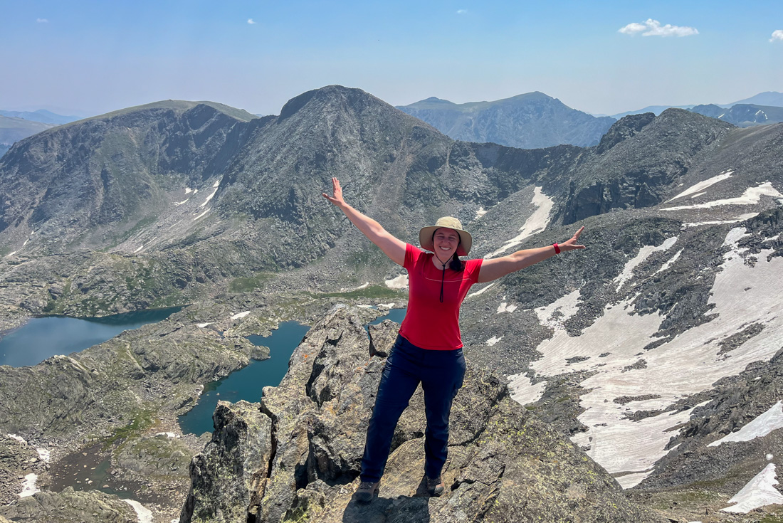 A happy moment at a high point of Mount Ida in Rocky Mountain National Park