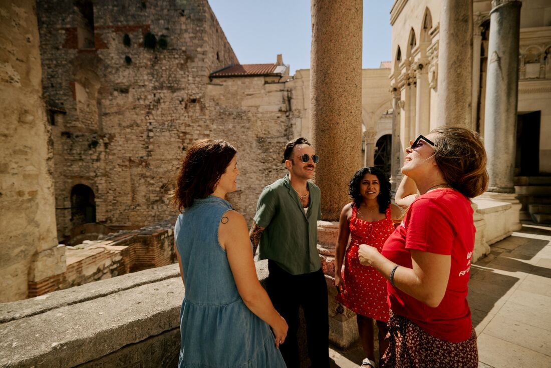 Travellers exploring interior structure of Diocletian's Palace in Split, Croatia